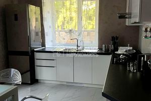 будинок за адресою Льва Ландау просп. (50-річчя СРСР), 132