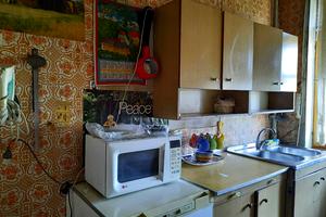 квартира за адресою Куликівський узвіз (Революції), 8/10