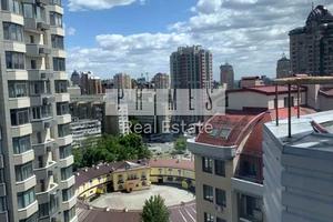 комерційна за адресою Євгена Коновальця вул. (Щорса), 32-А