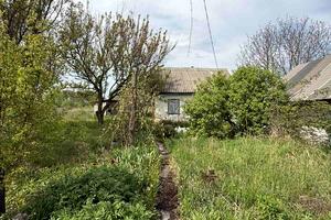 участок по адресу Лесі Українки