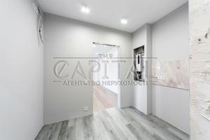 комерційна за адресою Метрологічна вул., 58
