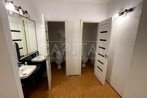 комерційна за адресою Бульварно-Кудрявська вул. (Воровського), 8