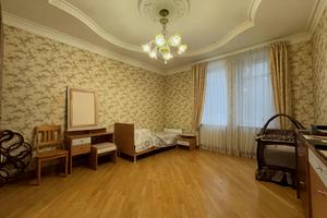 будинок за адресою Постишева вул., 1