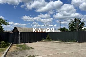 комерційна за адресою Олега Ольжича вул., 48А