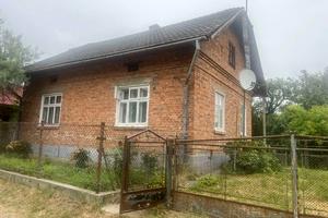 будинок за адресою смт. Розділ, Чвертьова вул., 12