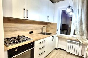 квартира по адресу Белая ул., 105