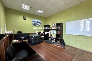 комерційна за адресою Олега Ольжича вул., 48