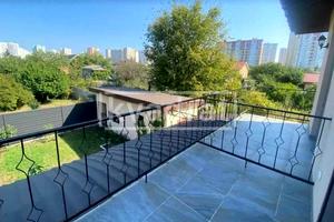 будинок за адресою 52-га Садова вул.