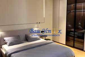 будинок за адресою Набережна вул., 77