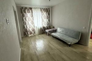 квартира по адресу Строителей ул., 14