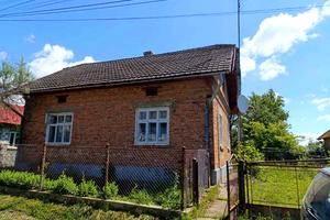 будинок за адресою смт. Розділ, Чвертьова вул., 12
