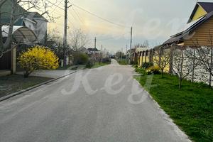 ділянка за адресою Сухомлинського