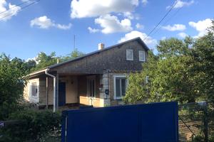 будинок за адресою Першотравнева
