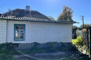 будинок за адресою смт. Пісочин, провулок Лісовий