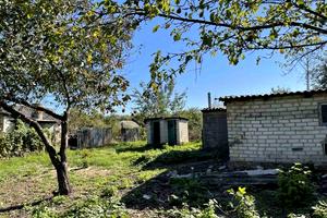 будинок за адресою смт. Пісочин, провулок Лісовий