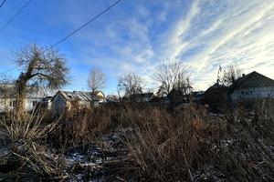 участок по адресу Євгена Коновальця ул.
