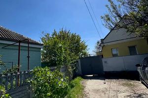 будинок за адресою Паші Ангелініної, 61