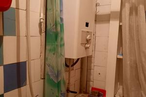 квартира за адресою Куликівський узвіз (Революції), 8/10