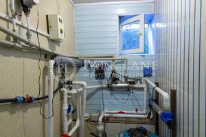 будинок за адресою Огіркова вул., 1