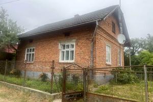 будинок за адресою смт. Розділ, Чвертьова вул., 12