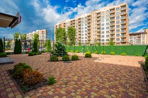 комерційна за адресою Метрологічна вул., 56