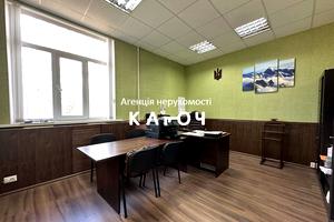 комерційна за адресою Олега Ольжича вул., 48А