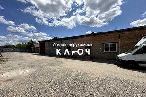 комерційна за адресою Олега Ольжича вул., 48А