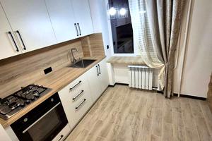 квартира по адресу Белая ул., 105