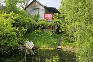 участок по адресу 27-ма Садова