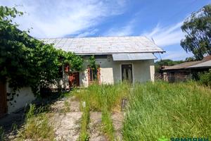 будинок за адресою с. Милування, Миру, 80