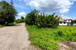 участок по адресу Комарова, 72