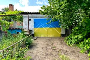 будинок за адресою вул. Мальвова