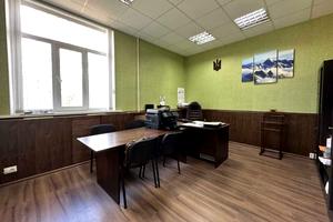 комерційна за адресою Олега Ольжича вул., 1