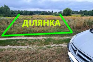 участок по адресу Приморська