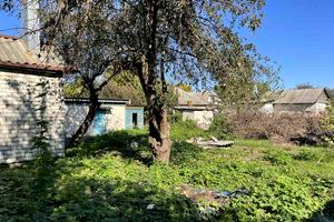 будинок за адресою смт. Пісочин, провулок Лісовий