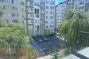 квартира по адресу Строителей ул., 30