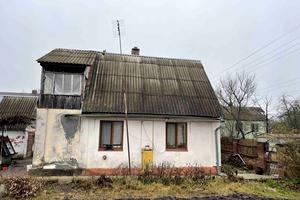 дом по адресу с. Новая Украинка, Нова