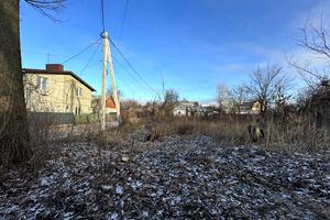 участок по адресу Євгена Коновальця ул.