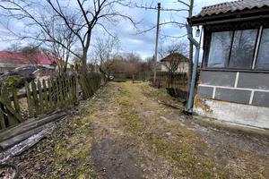 будинок за адресою с. Кобзарівка, Центральна
