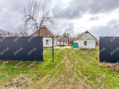 будинок за адресою с. Жуки, Центральна, 1