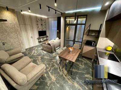 квартира за адресою Костомаровська, 1А