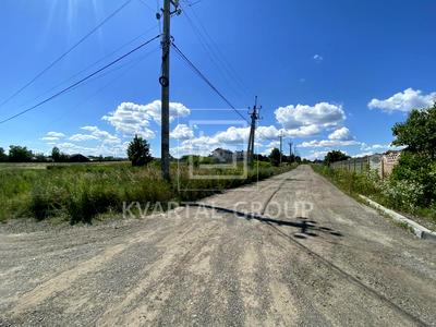 участок по адресу Хуторская ул. (Жовтнева), 48/2