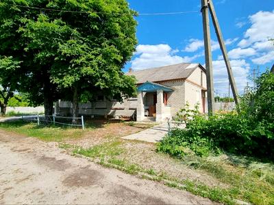 комерційна за адресою смт. Нова Водолага, Грушевського, 1