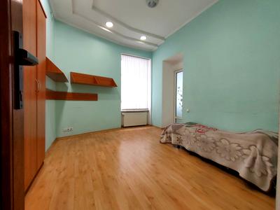 комерційна за адресою Троїцька вул., 7
