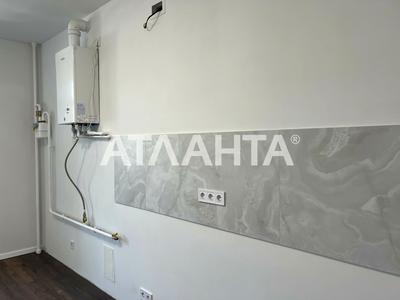 квартира за адресою с. Гатне, Сімейна вул., 1