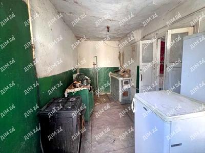 будинок за адресою с. Жуки, Центральна, 1