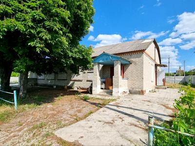комерційна за адресою смт. Нова Водолага, Грушевського, 1