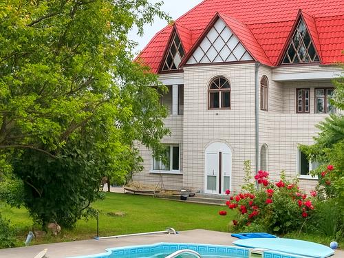 будинок за адресою Олени Теліги вул. (8 березня), 7