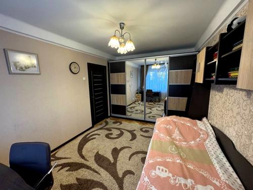 квартира по адресу Строителей ул., 12-Б